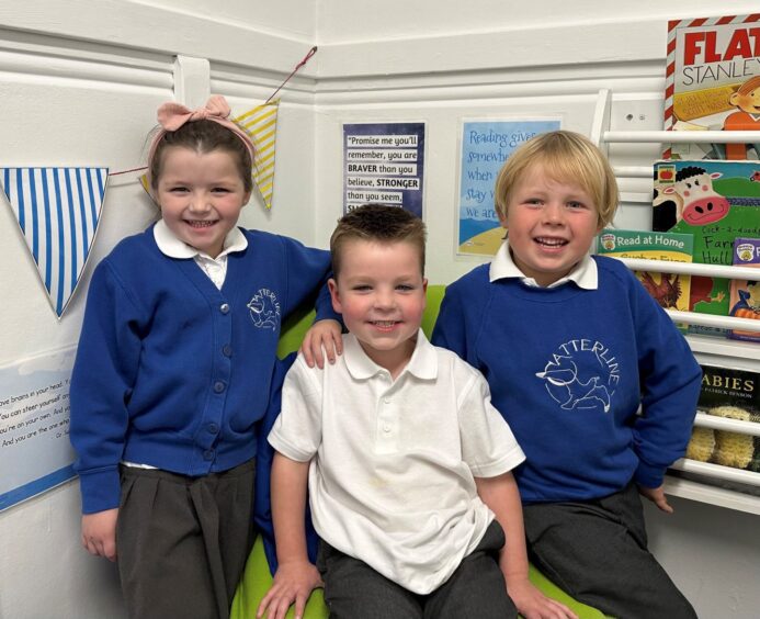 Three P1 pupils at Catterline School Primary.
