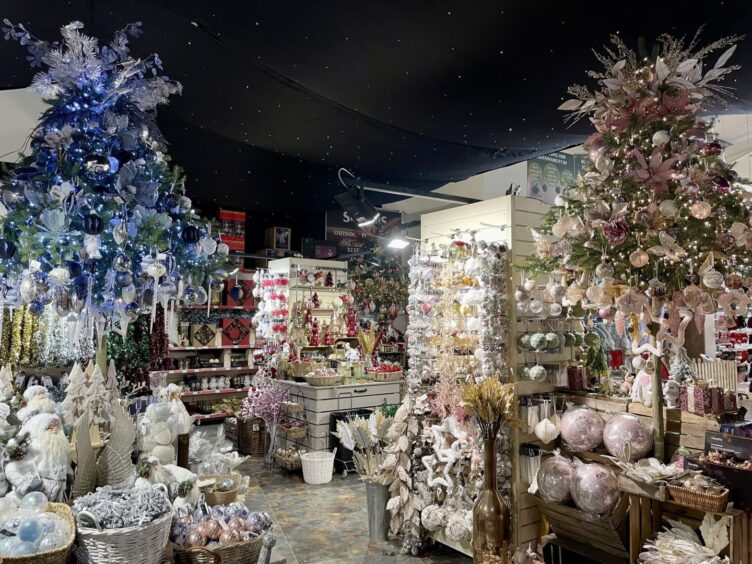Interior of Inverness store with Christmas decor.
