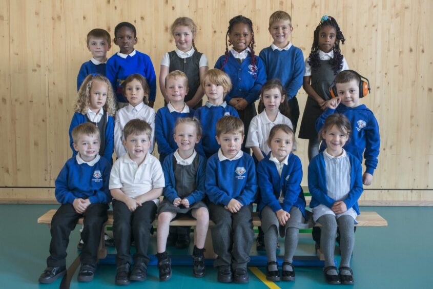 Class P1S at Countesswells Primary School. The children are arranged in three rows of six