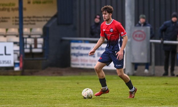 Aberdeen defender Finlay Murray, pictured in action during his loan spell with Turriff United.