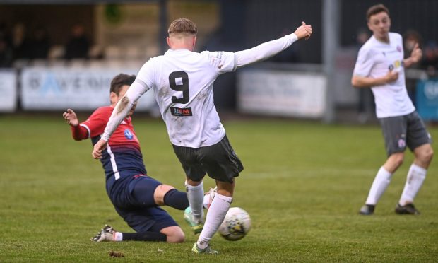 Grady McGrath, centre, scores for Brechin City against Turriff United. Pictures by Darrell Benns/DCT Media
