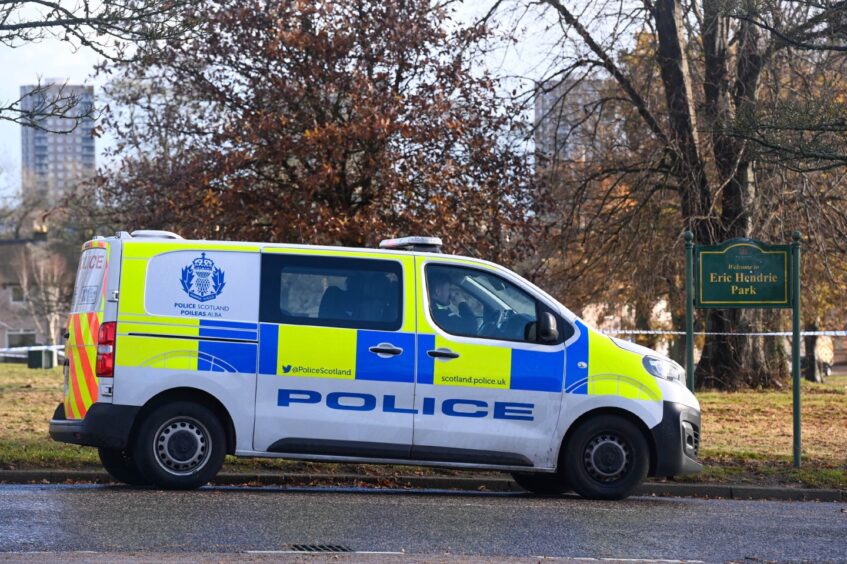 Police van parked next to Eric Hendrie Park