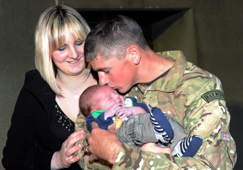 Solders were re-united with family upon their return. Supplied by DCT Archives.