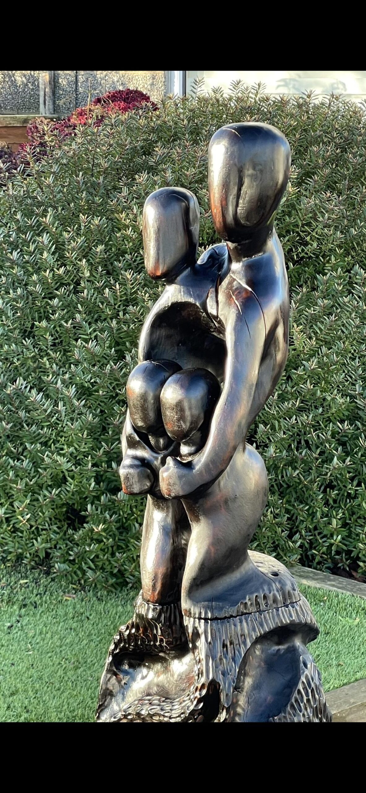 Sculpture family with twins by David Dawson. 