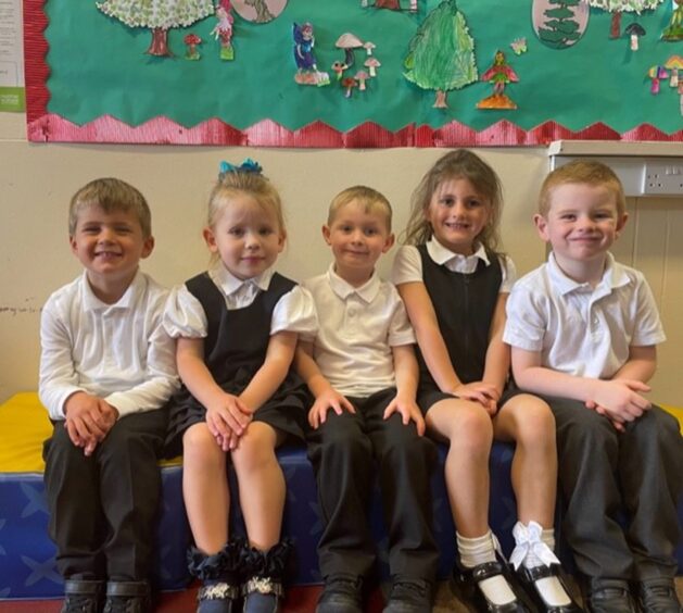 Five primary 1 pupils from Fetterangus Primary School