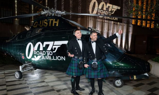 Sam and James O'Neill turn on the style at the launch event for Amazon Prime's 007 show.