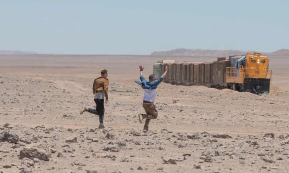 James and Sam running across the desert in Chile.