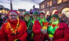 Santa had some elf helpers at Inverness Christmas lights switch-on. Paul Campbell
