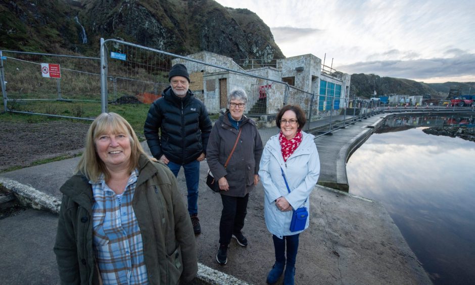 Chairwoman Pat Wain (front), project coordinator Wicek Sosna (back), treasurer Lorraine Smith and trustee Joy Gauld at the Tarlair pool construction site.