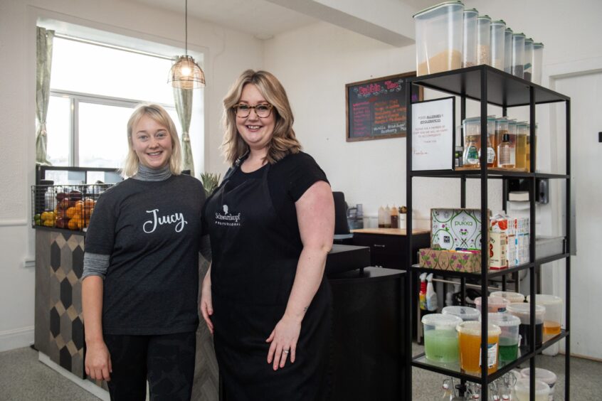 Barista Georgina Mansell with owner Jacquelyn Young.