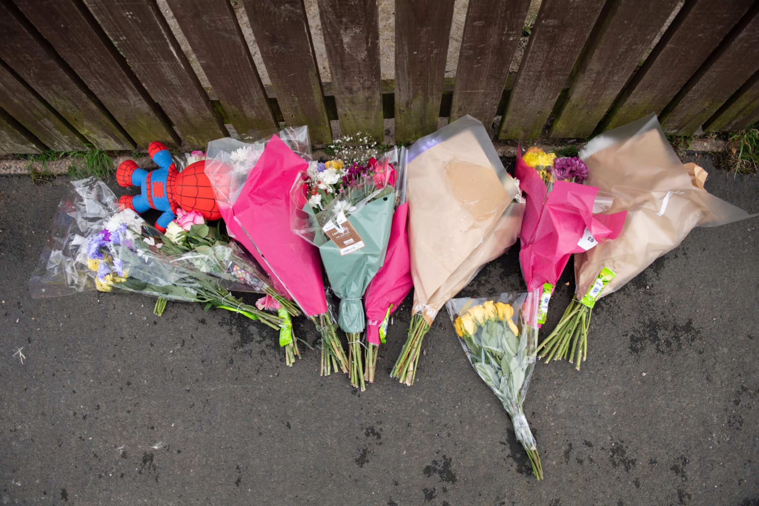 Floral tributes to Kiesha Donaghy, who was murdered at her home in Anderson Drive, New Elgin.