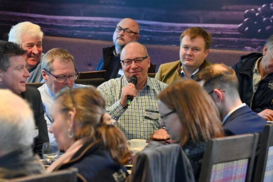 Kevin Gilbert pictured in a discussion at a 
previous farming breakfast. Image: Kenny Elrick/DC Thomson