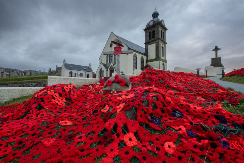 Macduff Parish Church has been showered by 13,000 knitted poppies as part of their annual remembrance display.
