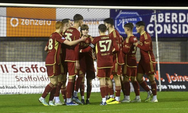 The Aberdeen players celebrate after scoring against Buckie Thistle in the Aberdeenshire Shield semi-final. Pictures by Kenny Elrick/DCT Media