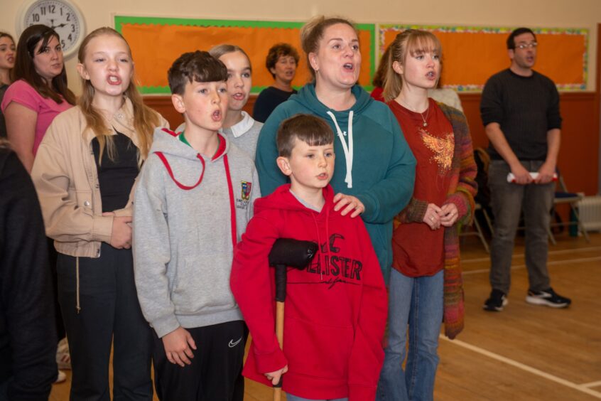 Children and adults taking part in rehearsals for Scrooge at Ferryhill Parish Church. 