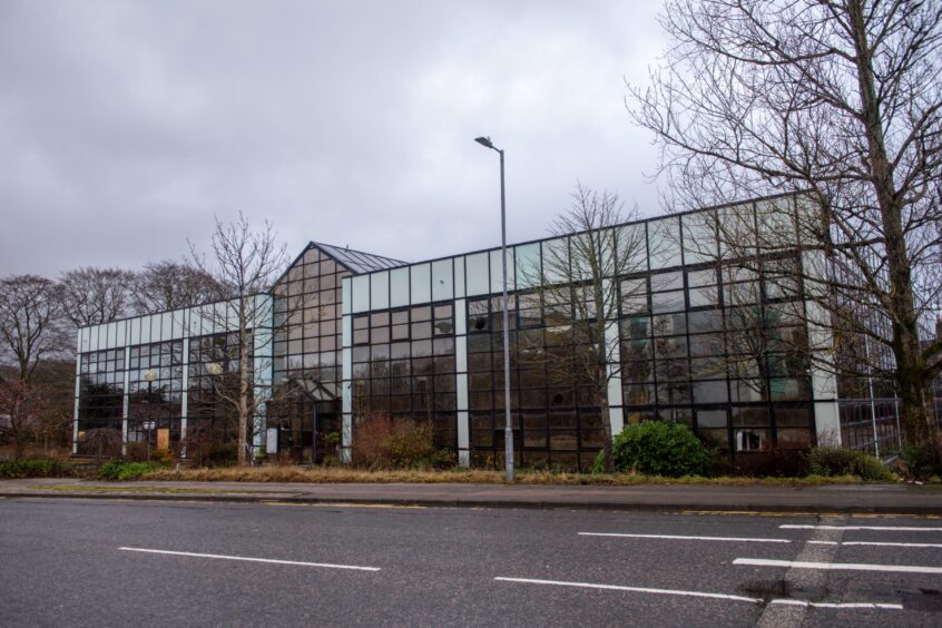 The Alba Gate building could be demolished if plans for an EV charging station and drive-thru restaurants are approved. Image: Kath Flannery/DC Thomson