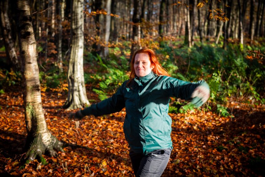 Jennifer dancing in the forest