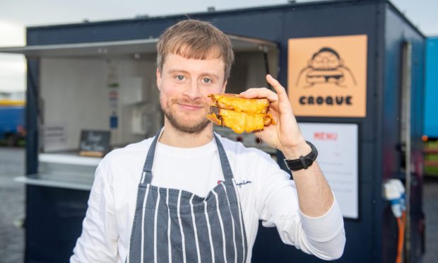 Derek Park, owner of Croque in front of his food truck at Aberdeen beach