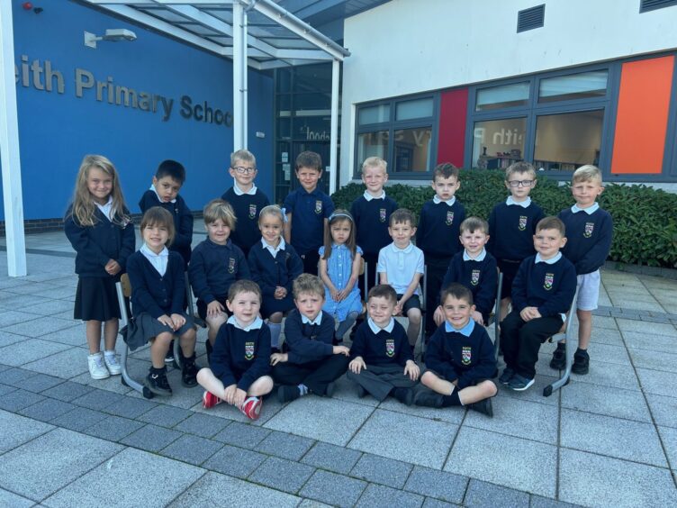 Keith Primary School's class P1M outside the school entrance.