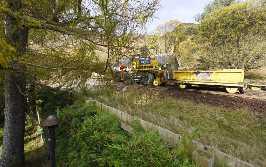 Heavy machinery doing repair work for Network Rail next to Lochailort charity Kirsty's Kids.