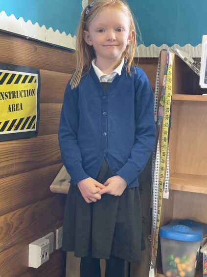 A single primary 1 pupil at Logie Coldstone School.