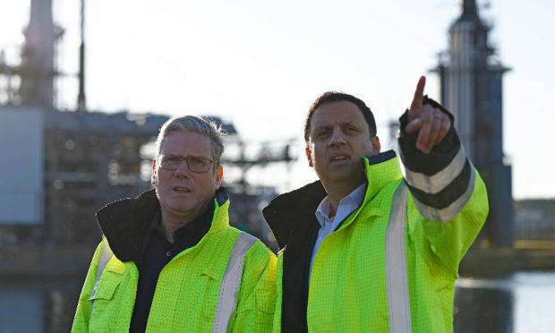 Prime Minister Keir Starmer (left) with Scottish Labour leader Anas Sarwar, during a visit to St Fergus Gas Terminal, a clean power facility in Aberdeenshire. Image: Jeff J Mitchell/PA Wire