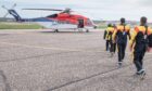 Oil workers boarding a CHC-operated S-92 in Aberdeen.