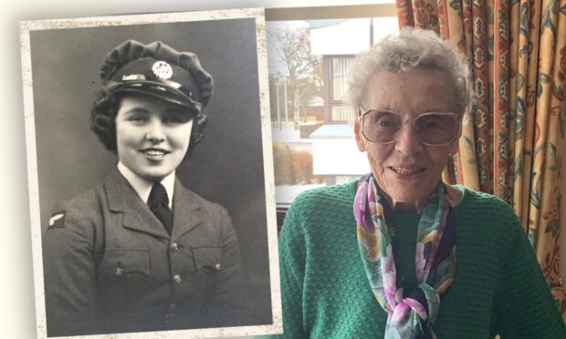 Mary Forbes of Aberdeen with a photo of her in the RAF next to her