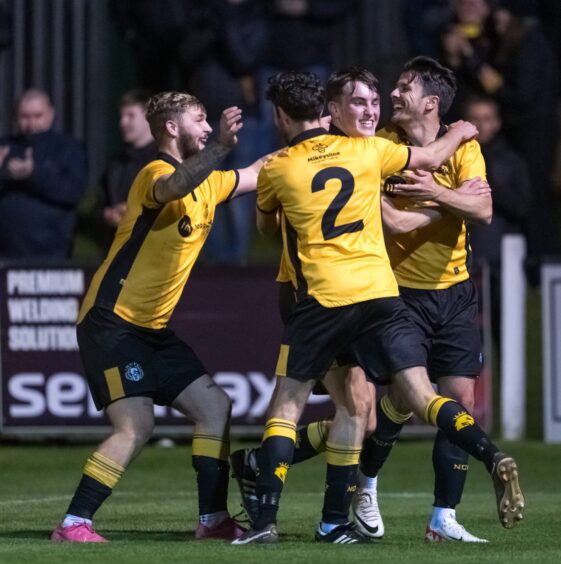 Steven Mackay celebrates scoring for Nairn County against Caley Thistle in the North of Scotland Cup.