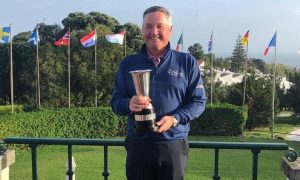 Nick Robson holding a trophy