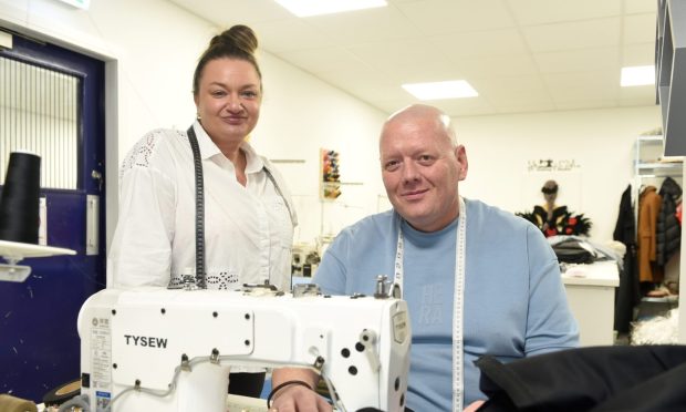 Anna and Piotr Kubiak inside their new tailoring and upholstery store in Inverness. Image: Sandy McCook/DC Thomson