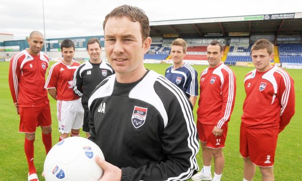 Derek Adams unveils his summer signings in 2008. Image: Sandy McCook/DC Thomson.