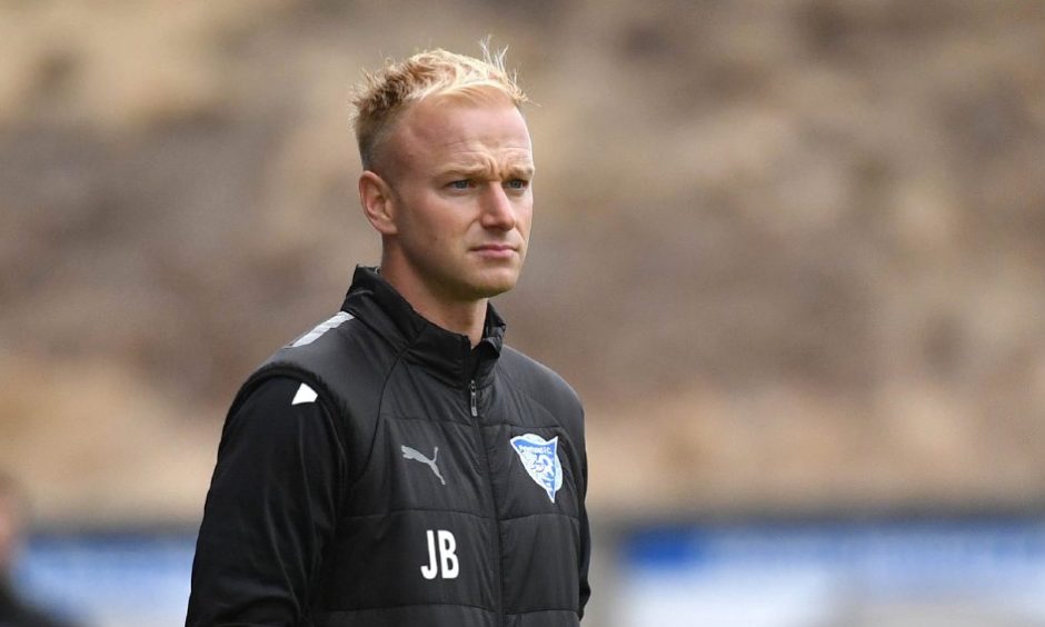 Peterhead co-manager Jordon Brown on the sidelines during a match.