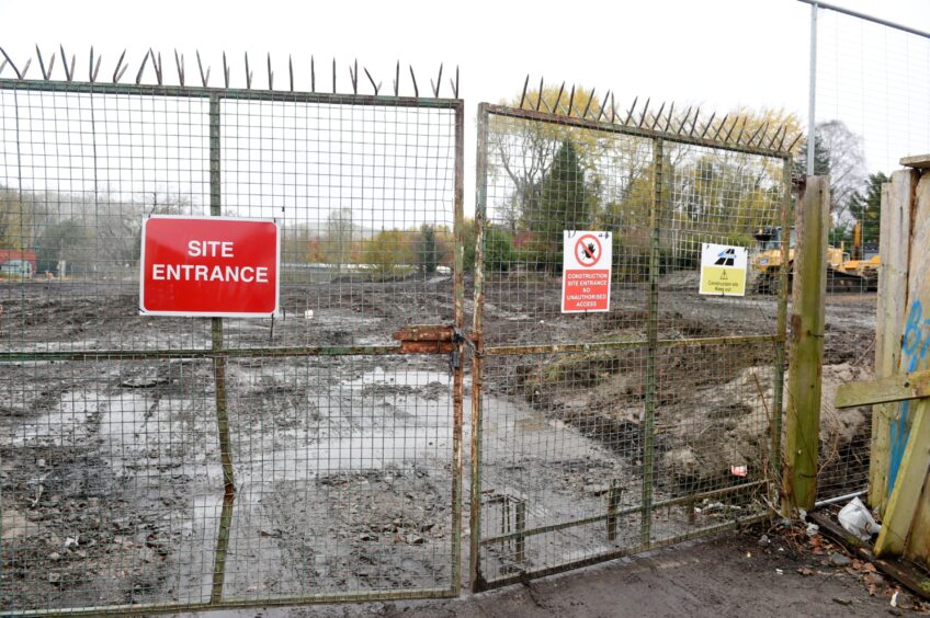 Barren site before it was transformed into the new Dingwall Home Bargains store.