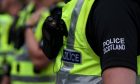 inverness man arrested arned with a knife police scotland officer uniform