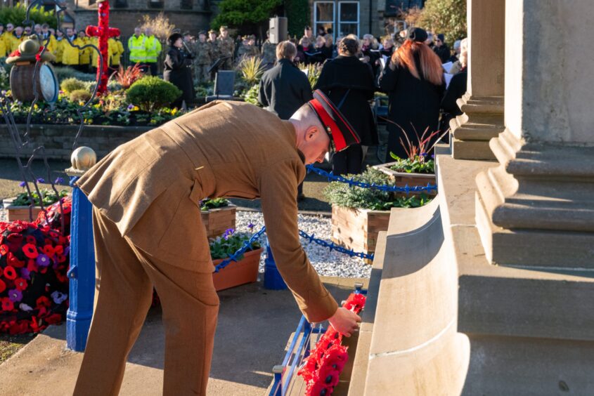 A wreath is laid in Buckie