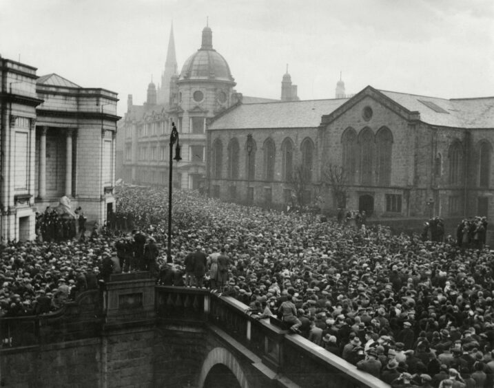 Picture shows; People gather at Aberdeen City war memorial on Remembrance day. Aberdeen. Supplied by DCT Archives.