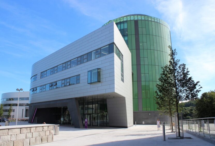 Robert Gordon University building on campus in Aberdeen under a blue sky. 