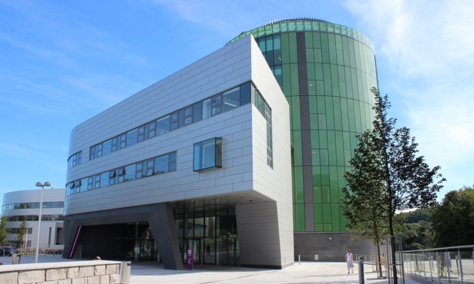 Robert Gordon University building on campus in Aberdeen under a blue sky.