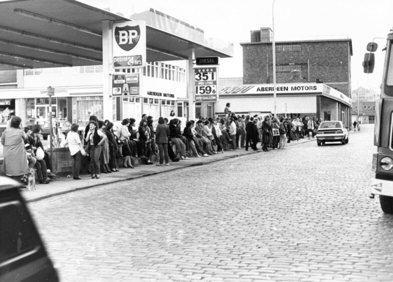 Fans line up the High street in anticipation of the bands show. Supplied by DCT Archives.