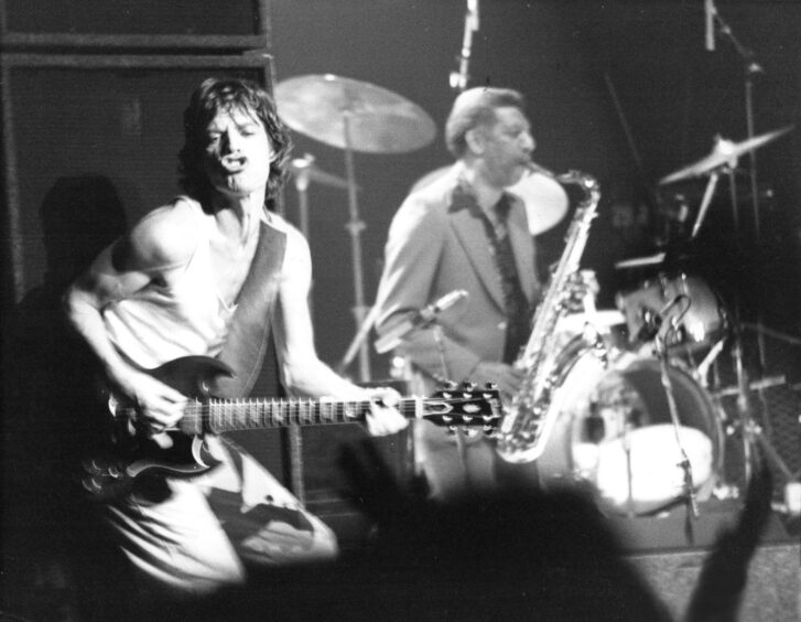 Mick Jagger (left) strikes a pose for the audience. Supplied by DCT Archives.