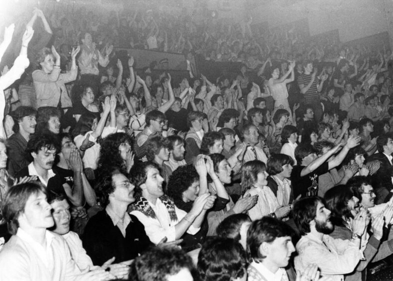 Fans show their appreciation for the rockers after a long show. Supplied by DCT Archives.