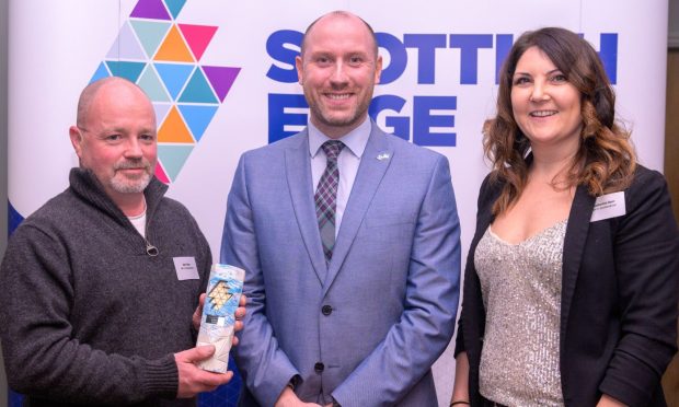 Kerr and Katherine Byer, of Scottish Edge winner SIP IT (Scotland) with Wellbeing Economy, Fair Work and Energy Cabinet Secretary Neil Gray, centre, in. Glasgow.