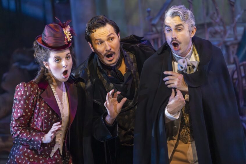 Simone McIntosh (Rosina), Samuel Dale Johnson (Figaro) and Anthony Gregory (Count Almaviva) in The Barber of Seville. . 