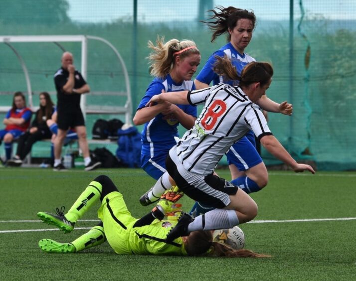 Sophie Goodwin in the process of getting her nose broken while playing for Montrose.