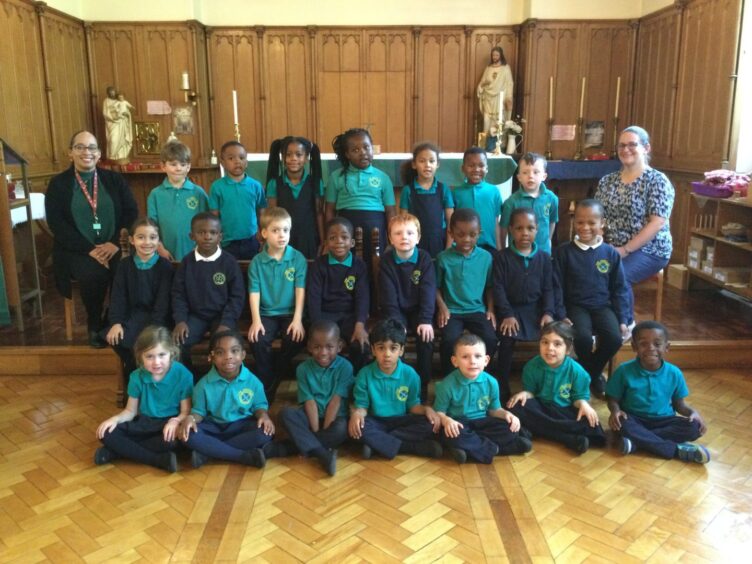 Class P1C at St. Joseph's RC Primary School in Aberdeen with two members of staff