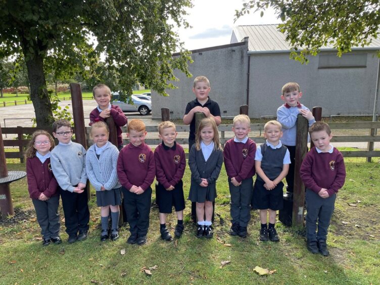 Strichen School's first class of 2023 in the playground of the Aberdeenshire school