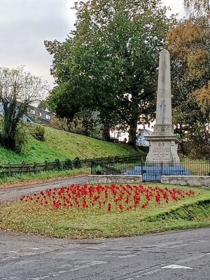 The grounds surrounding Avoch's war memorial have been covered in red poppies.