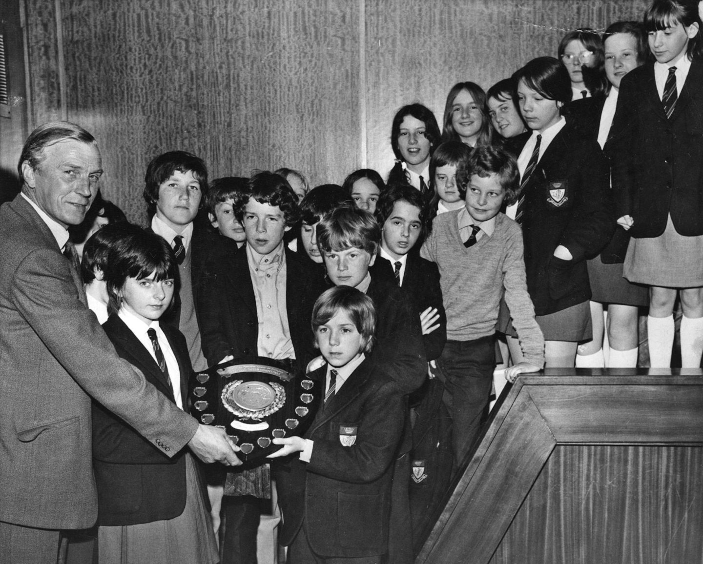 President of the Scottish Farmers' Union, D Morgan Milne, presented the Senior Award in the SFU Farms Competition Shield to Nadia Ross and Ronald Stewart on behalf of Class 1F at Summerhill Academy, Aberdeen, in this picture from July 1971.