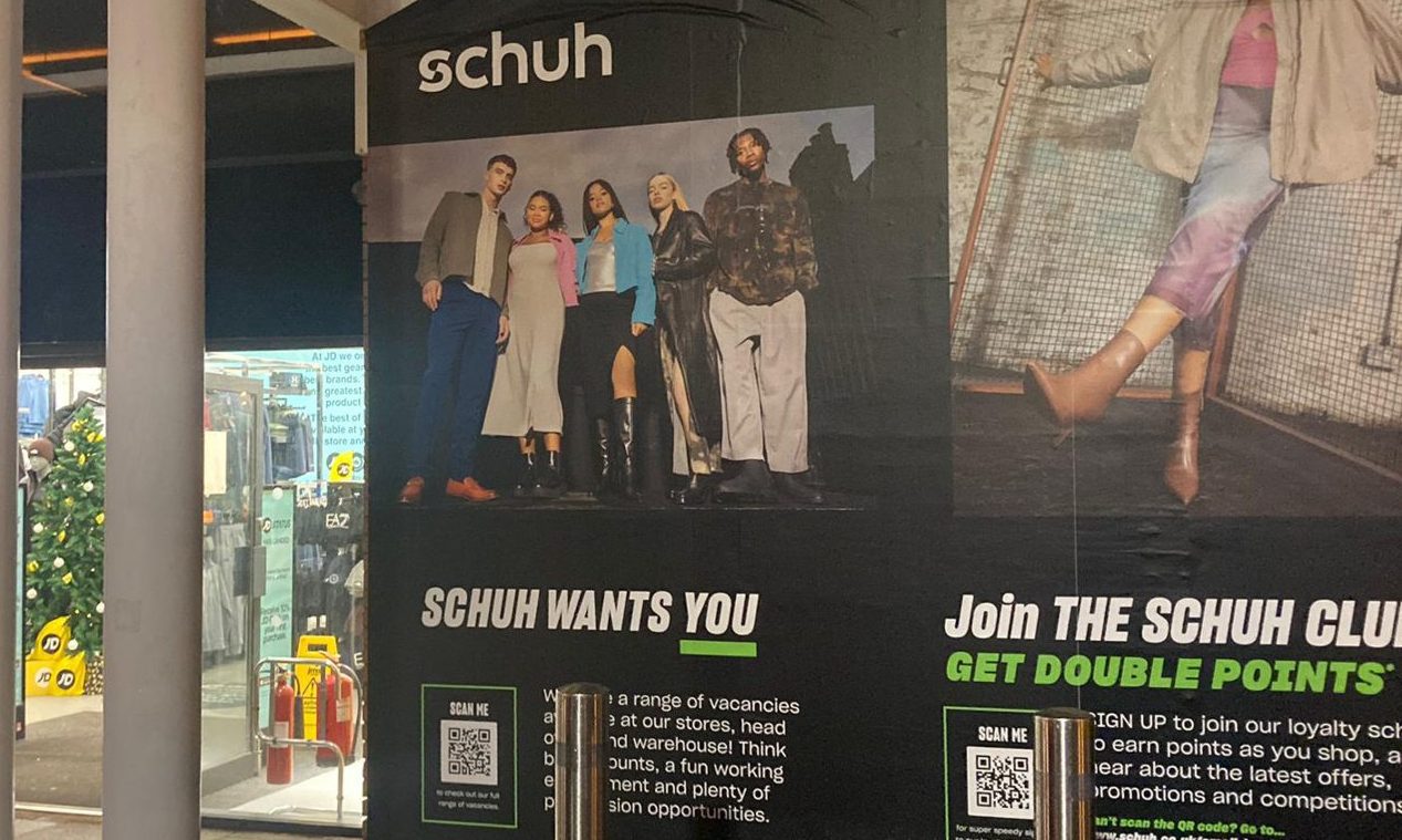 Sign showing vacancies at Schuh's new store at Inverness retail park.